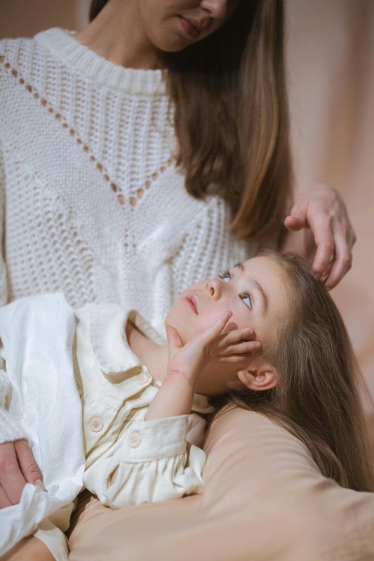 parent comforting child after nightmare