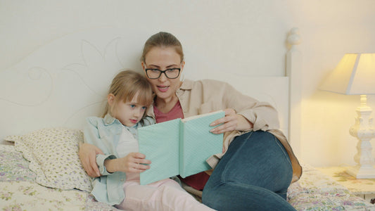 parent reading bedtime story as part of a calm bedtime routine for kids