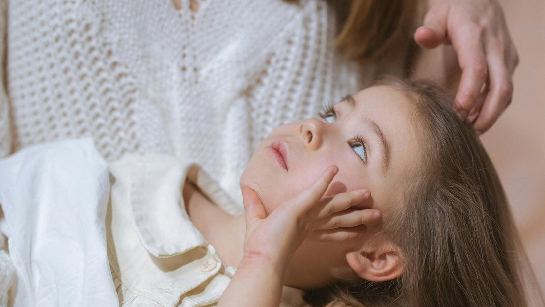parent comforting child after nightmare