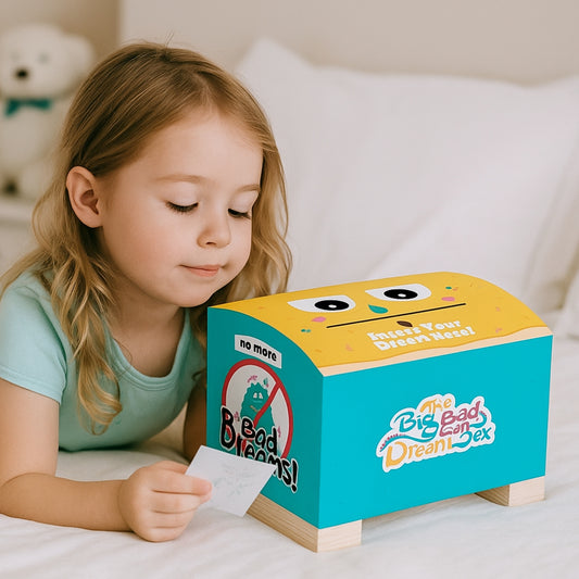 Child interacting with a colourful the big bad dream box on a bed